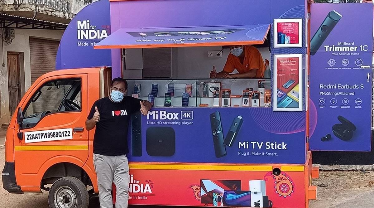 xiaomi india, xiaomi sells phones van, xiaomi van rural areas, xiaomi mobile van, xiaomi manu kumar jain, mi store van