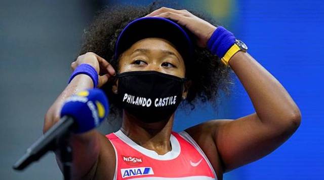 Naomi Osaka wore black masks at US Open, featuring names of victims of racial injustice. (Source: AP Photo/Seth Wenig)
