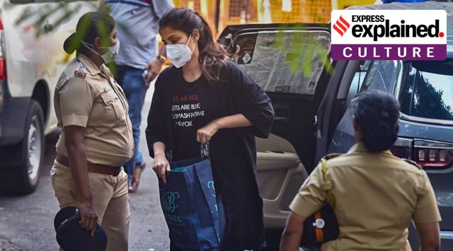 Rhea Chakraborty at the NCB office in Mumbai’s Ballard Estate. Her T-shirt reads 'Roses are red, violets are blue, let’s smash patriarchy, me and you'. (PTI Photo)
