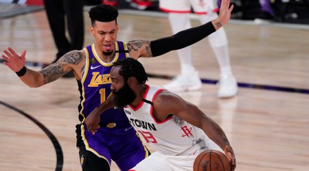 Houston Rockets' James Harden (13) drives past Los Angeles Lakers' Danny Green, left, during the second half of an NBA conference semifinal playoff basketball game Friday, Sept. 4, 2020, in Lake Buena Vista, Fla. (AP Photo/Mark J. Terrill)
