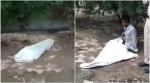 sleeping dead body viral video, man sleeping confused dead body trending, man sleeping thought dead body, indian express, indian express news, funny videos, viral videos,