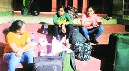 Residents outside the locked Mata Kasturba Girls Hostel