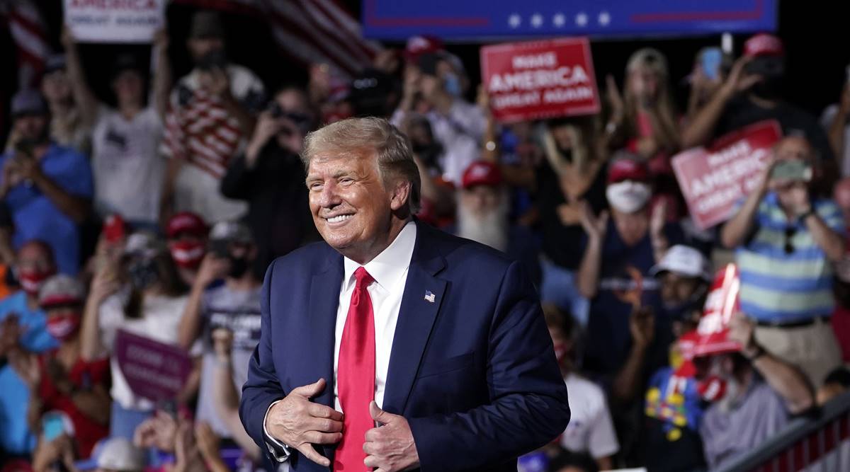 donald trump, donald trump herd mentality, US, donald trump viral video, donald trump downplays coronavirus, covid-19, trending, indian express, indian express news