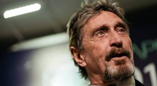McAfee, John McAfee arrested, John McAfee  us tax evasion, John McAfee  tax fraud, McAfee founder arrested, McAfee antivirus, McAfee  cybersecurity