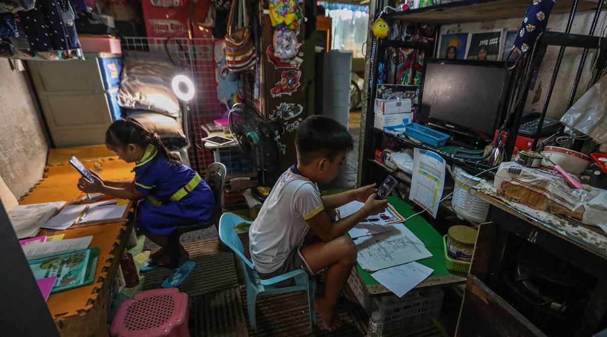 Schools teach by text message as Covid widens Philippine digital divide