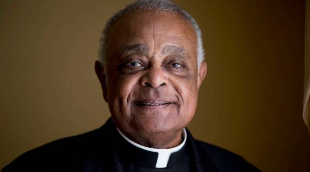 FILE - This Sunday, June 2, 2019, file photo shows Washington D.C. Archbishop Wilton Gregory posed for a portrait following mass at St. Augustine Church in Washington.  (AP Photo/Andrew Harnik, File)