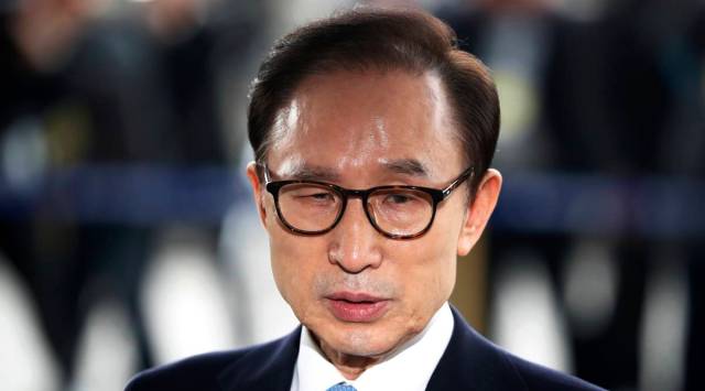 FILE - In this March 14, 2018, file photo, former South Korean President Lee Myung-bak arrives for questioning over bribery allegations at the Seoul Central District Prosecutors' Office in Seoul, South Korea. (AP)