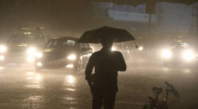 The rain picked up late Wednesday as the low pressure system approached south Maharashtra, causing widespread but moderate rain. (Express photo by Ganesh Shirsekar)
