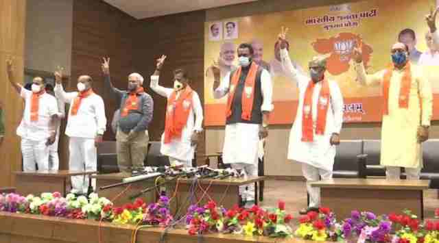 Gujarat: JV Kakadiya, Jitu Chaudhary, Brijesh Merja, Pradyumansinh Jadeja & Akshay Patel - five leaders who gave up the memberships of the state Assembly and Congress before Rajya Sabha elections join BJP in Gandhinagar. (Photo: ANI)