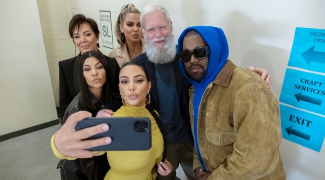 Kim Kardashian, along with Kanye West, Kris Jenner, Kourtney Kardashian and Khloe Kardashian with David Letterman. (Photo: Netflix)