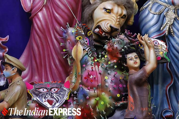 Durga Puja in the pandemic, Durga Puja 2020 in Kolkata, Kolkata Durga Puja, Coronasura Durga Puja Kolkata, pandemic, indian express news