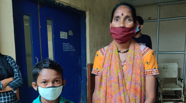 Ravi Dixit waits for a donor with mother Ujwala outside blood bank in Sion