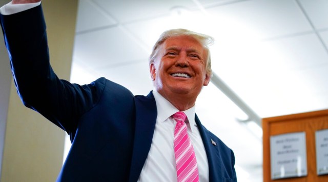President Donald Trump talks with reporters after casting his ballot in the presidential election, Saturday, Oct. 24, 2020, in West Palm Beach, Fla. (AP)