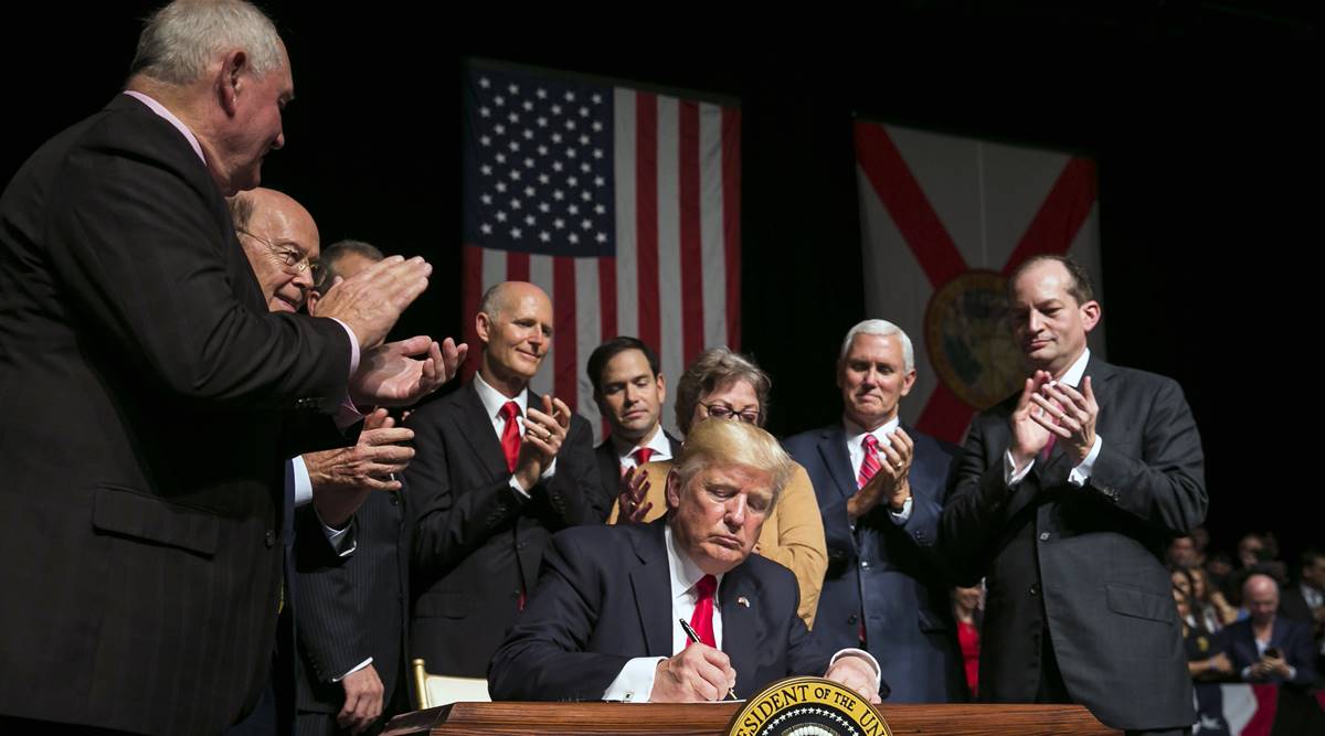 US President Donald Trump approves restrictions on Americans’ ability to travel to and do business with Cuba in Miami on June 16, 2017. (Al Drago/The New York Times)