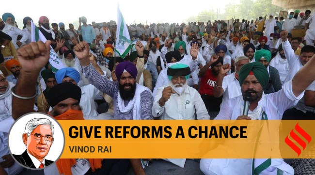 Protesting farmers block NH-1 near Ladowal toll plaza in Ludhiana during a "Chakka jam" against farm bills. (Express Photo by Gurmeet Singh/File)