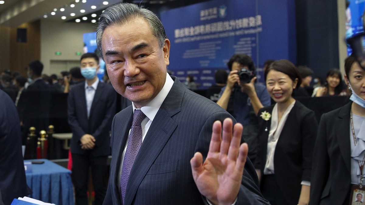 In this Sept. 28, 2020, file photo, Chinese Foreign Minister Wang Yi waves after delivering a speech at the Lanting Forum held at the Ministry of Foreign Affairs office in Beijing. (AP)
