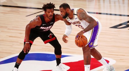 Los Angeles Lakers forward LeBron James (23) dribbles while defended by Miami Heat forward Jimmy Butler (22) during the third quarter of game three of the 2020 NBA Finals (Source: USA TODAY Sports)
