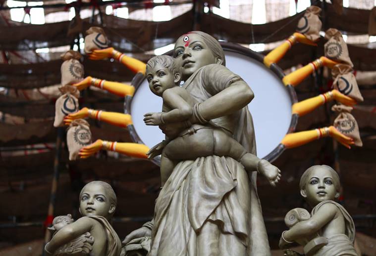 A Durga puja pandal showcases women migrant workers in place of the goddess  | Lifestyle News,The Indian Express