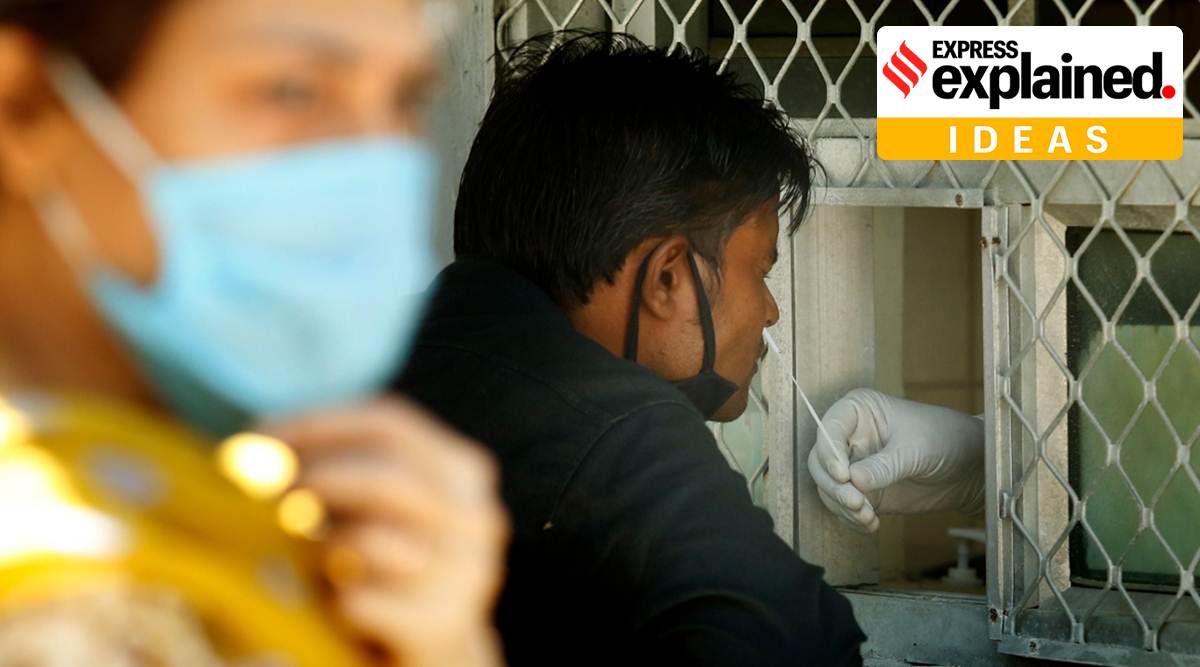 Questions have been raised about the accuracy of Covid-19 mortality data. The WHO had defined what counts as a Covid-19 death. At a testing facility in the national capital. Express Photo by Praveen Khanna