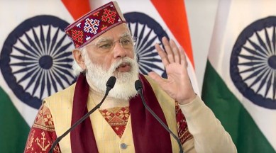 Prime Minister Narendra Modi addresses during the inauguration of Atal tunnel, world's longest highway tunnel, in Manali, Saturday, Oct. 3, 2020. (DD/PTI Photo)