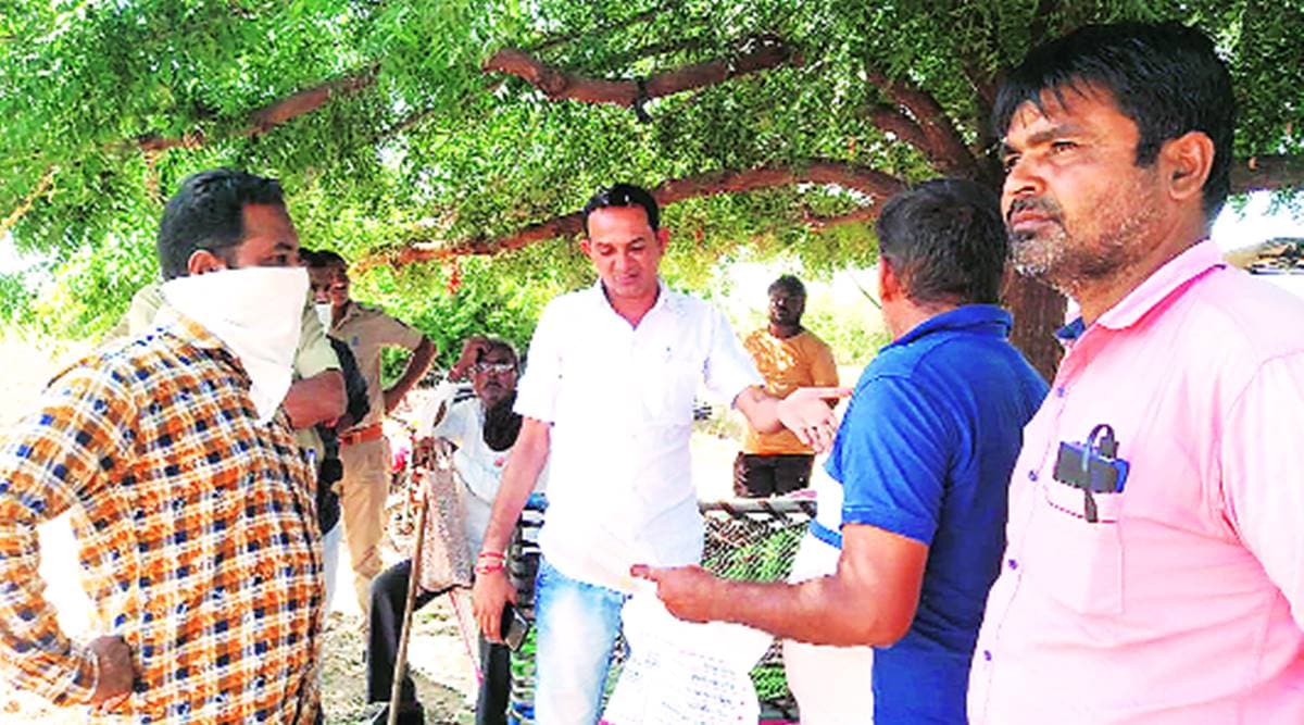Gujarat Dalit cooperative society, Dalit land in Rapar, Dalits tey take their land, Rajkot news, Gujarat news, Indian express news