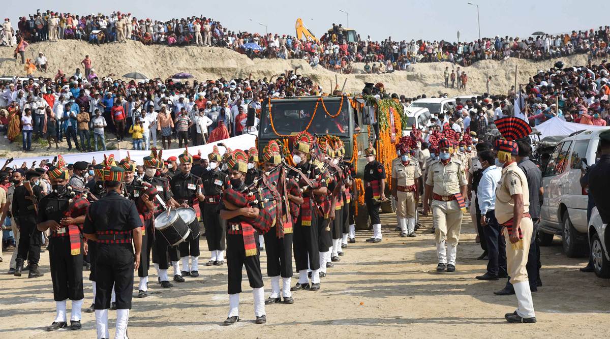 Army personnel pay tribute as vehicle carrying the mortal remains of Union Minister and Lok Janshakti Party (LJP) leader late Ramvilas Paswan arrives at Digha Ghat, during his funeral procession, in Patna, Saturday, Oct. 10, 2020. (PTI Photo)