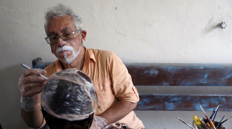 Coronavirus, COVID-19, Brazil, Mask art, Face mask art, Face mask painting, Trending news, Indian Express news