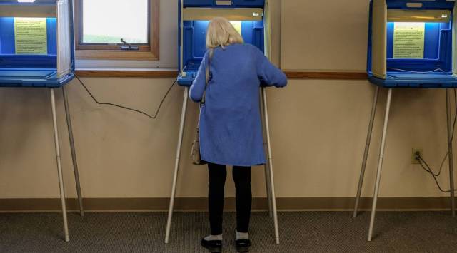A voter casts their ballot at a polling location for the 2020 Presidential election in Milwaukee, Wisconsin, U.S., on Tuesday, Nov. 3, 2020. Photographer: Alex Wroblewski/Bloomberg
