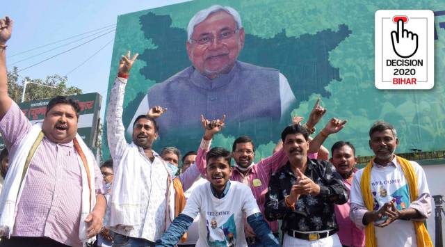 JD(U) supporters celebrate in Patna on Tuesday (AP)