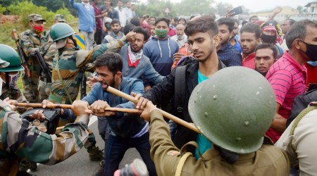 North Tripura: Joint Movement Committee (JMC) members clash with the security personnel during a protest against the resettlement of displaced Bru migrants in Kanchanpur sub-division, at Panisagar in North Tripura district, Saturday, Nov. 21, 2020. (PTI Photo) (PTI21-11-2020_000244A)