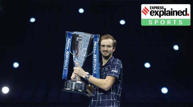 Daniil Medvedev of Russia holds up the winners trophy after defeating Dominic Thiem of Austria in the final of the ATP World Finals tennis match at the ATP World Finals tennis tournament at the O2 arena in London, Sunday, Nov. 22, 2020. (AP)


