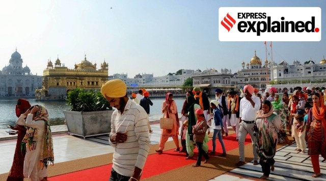 Sikh devotees offer prayers at the Golden Temple in Amritsar, Tuesday, Nov. 17, 2020, when Shiromani Gurdwara Parbandhak Committee (SGPC) celebrated its 100th foundation day. (PTI Photo)