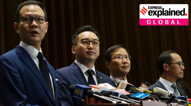 Hong Kong, Hong Kong pro-democracy lawmakers resign, Hong Kong politics, Hong Kong legislation, Indian Express
