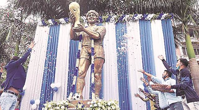 Fans pay tribute to Maradona in Kolkata on Thursday. (Express photo by Partha Paul)