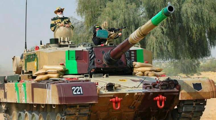 PM Modi in Jaisalmer, PM modi in Rajasthan pics, Pm modi Jaisalmer pic, pm modi Jaisalmer photos, pm modi diwali celebration, pm modi diwali celebration Indian Army, pm modi diwali with jawans, Indian express