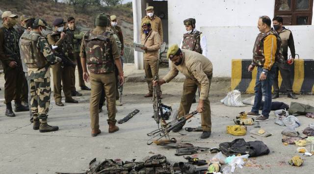 Jammu: Security personnel inspect the site of encounter at Nagrota Ban toll plaza in Jammu (PTI)
