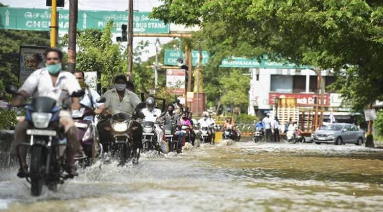 Vehicles ply on waterlogged road of Indira Gandhi Square after heavy rain  following the landfall of Cyclone Nivar, in Puducherry, Thursday, Nov. 26, 2020. (PTI Photo/R Senthil Kumar)