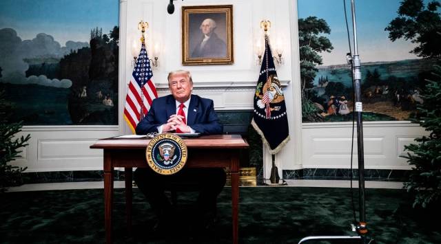President Donald Trump holds a video call with military personnel for Thanksgiving, at the White House in Washington, Nov. 26, 2020. (Erin Schaff/The New York Times)