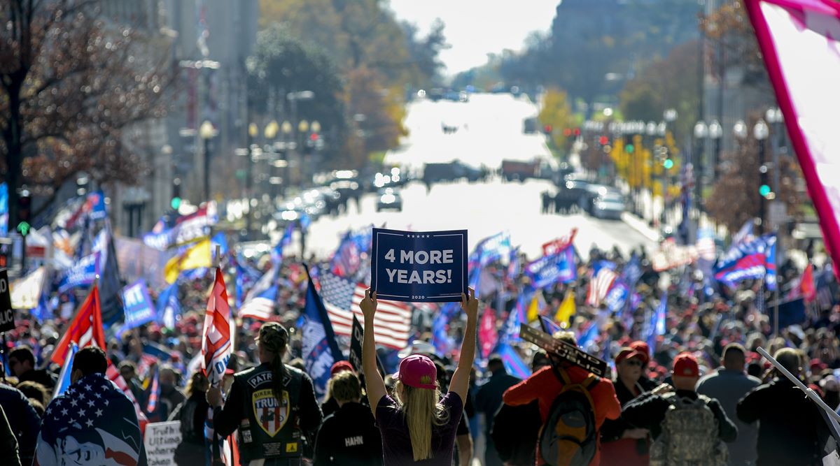 Supporters of President Donald Trump rally in support of the president, near Freedom Plaza in Washington on Saturday, Nov. 14, 2020. (Kenny Holston/The New York Times)
