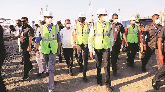 Uddhav Thackeray and Aaditya Thackeray visit the Coastal Road project site in Mumbai on Sunday. (Express photo by Ganesh Shirsekar)