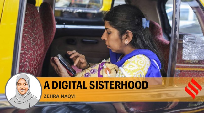 A woman uses a mobile phone as she sits inside taxi in Mumbai (Photographer: Dhiraj Singh/Bloomberg)