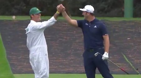 Jon Rahm attempted a trick shot that is part of the Masters practice round tradition. (Screengrab) 