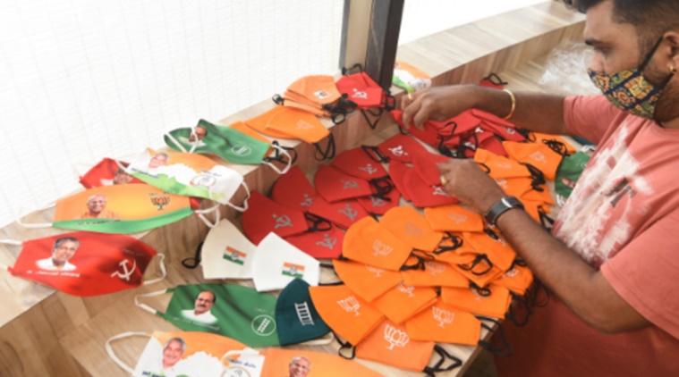 Kerala, political face masks, face masks as a campaign strategy, facemasks campaign tool, COVID-19, campaign strategies, Local body elections, Kerala news, Kerala local body election, Kerala panchayat elections, election campaign amid coronavirus, Kerala Coronavirus updates, Indian Express news.
