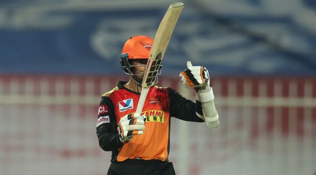 Wriddhiman Saha of Sunrisers Hyderabad raises his bat after scoring a fifty during match 56 of season 13 of the Dream 11 Indian Premier League (IPL) between the Sunrisers Hyderabad and the Mumbai Indians  held at the Sharjah Cricket Stadium, Sharjah in the United Arab Emirates on the 3rd November 2020.  Photo by: Deepak Malik  / Sportzpics for BCCI