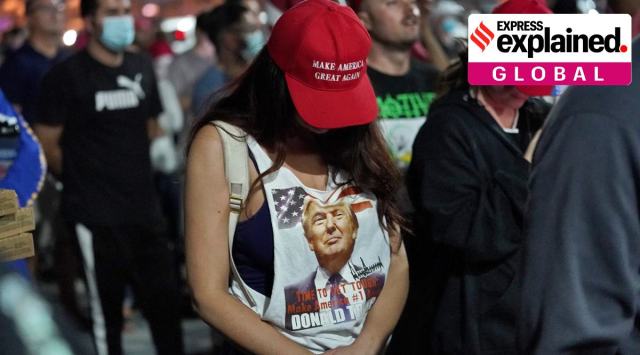 Supporters of President Donald Trump pause for prayer during a rally outside the Maricopa County Recorders Office, Wednesday, Nov. 4, 2020, in Phoenix. (AP Photo/Matt York)