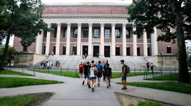 Students walk near the Widener Library in Harvard Yard at Harvard University in Cambridge. (File/Reuters)