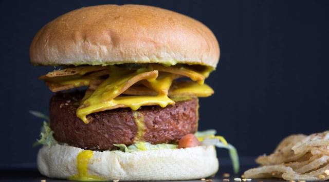 A 'my way' burger, made with a Beyond Meat Inc. plant-based burger patty, sits on the kitchen pass ready to serve inside a TGI Friday's Inc. restaurant in Moscow, Russia, (Photographer: Andrey Rudakov/Bloomberg)