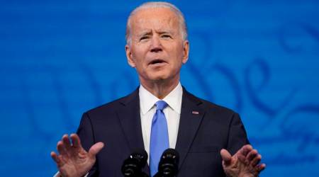 Retired doctors and more syringes: Biden lays out plan to get America vaccinated