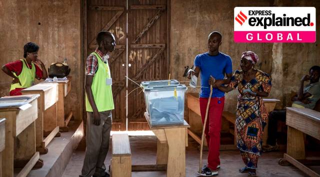 People cast their votes for presidential and legislative elections, at the Lycee Boganda polling station in the capital Bangui, Central African Republic Sunday, Dec. 27, 2020. (AP Photo)