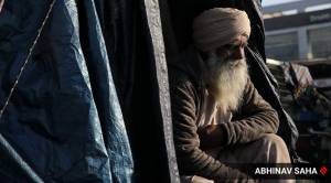 Farmers sit in protest against the new Farm Bill, at Tikri Border, New Delhi,  on December 29, 2020. Express photo by Abhinav Saha.